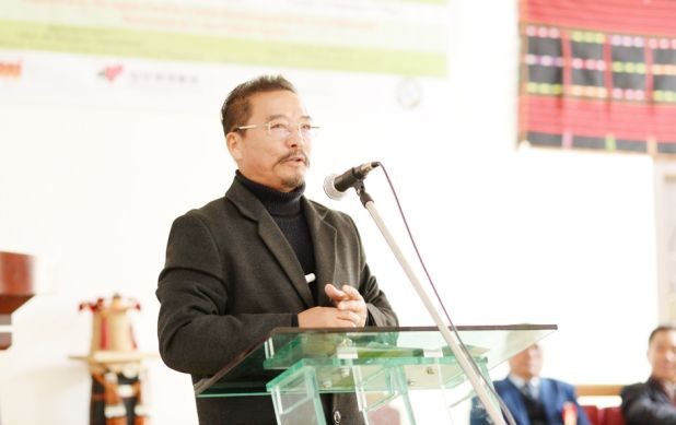 Advisor H Khehovi Yeputhomi addressing the third edition of Chengu Festival celebrated with special focus on traditional agriculture at Ghukhuyi village on January 18. (DIPR Photo)